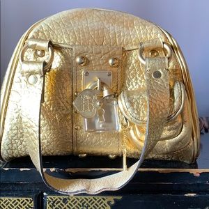 Juicy Couture gold purse perfect condition!